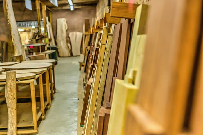 Long wall of wood stacked for browsing